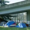 tents under a freeway in downtown seattle